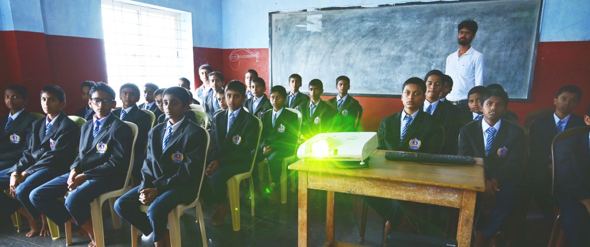 Projector-based smart class in progress for senior students in English medium