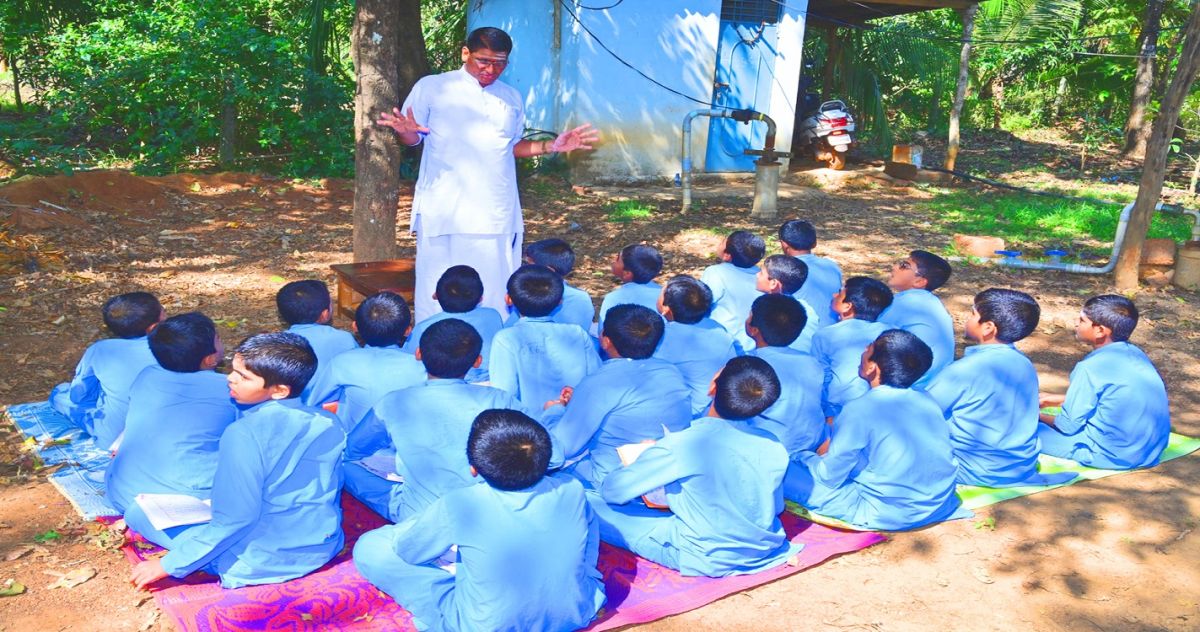 A teacher taking class at Sri Ramakrishna International Residential School, M.L. Halli, Sagar, Shivamogga